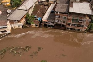 An aerial view shows a flooded street, caused due to heavy rains, in Itajuipe, Bahia state, Brazil December 27, 2021. Picture taken with a drone. REUTERS/Amanda Perobelli