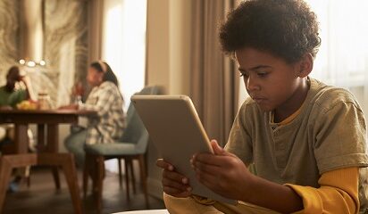 medium-shot-kid-holding-tablet