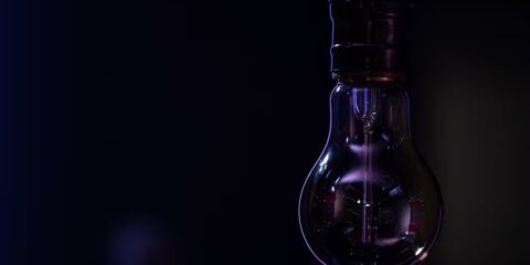 non-luminous-lamp-hangs-dark-blurred-background-copy-space